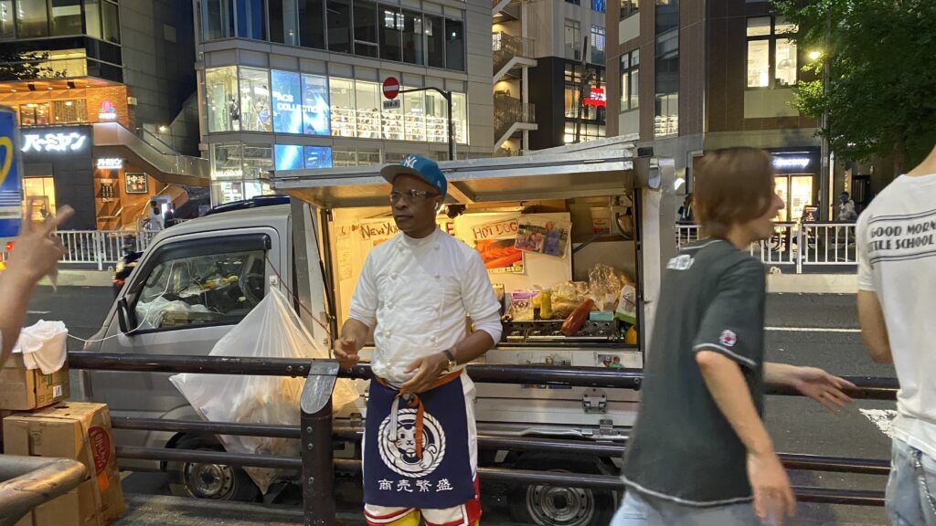 Kajuru Kenny in front of his food truck